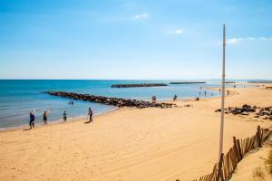 Maisons de vacances Bungalow de 3 chambres avec piscine partagee et terrasse a Vias a 1 km de la plage : photos des chambres