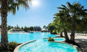 Maisons de vacances Bungalow charmant pres de Vias avec piscine partagee : photos des chambres