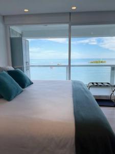 Lujoso apto con balcón, vista al mar y playa privada