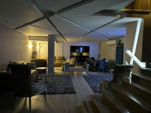 Trio villa with falls in compound فلا بحديقة كبيره وشلالات صناعية