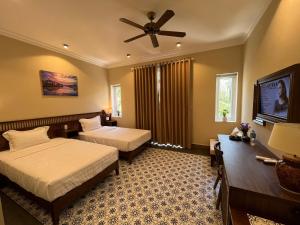 Phòng Hai Giường Đơn Loại Sang Hướng Thành Phố (Deluxe City View Twin Room)