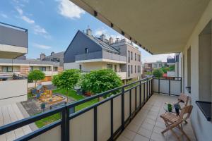 Elegant 1 Bedroom Apartment with Balcony in Wrocław by Renters