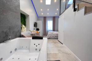 Appartements LoveRoom Paradise 2 - Balneo ! : photos des chambres