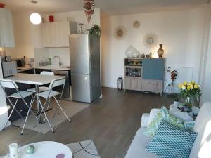 Appartements AppartCosy 50 m2 (avec garage) : photos des chambres