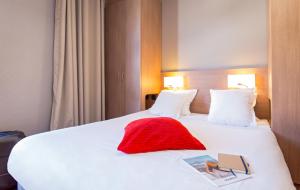 SOWELL HOTELS Le Pas du Loup : photos des chambres