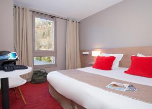 SOWELL HOTELS Le Pas du Loup : photos des chambres