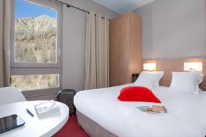 SOWELL HOTELS Le Pas du Loup : photos des chambres