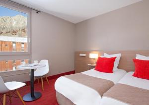 SOWELL HOTELS Le Pas du Loup : photos des chambres