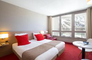 SOWELL HOTELS Le Pas du Loup : photos des chambres