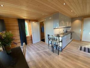 UTSIKTEN -exklusivt nybyggt timmerhus -Plintsberg.