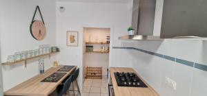 Appartements T2 55m² tout confort avec jardin. Cuisine et equipements neufs. Wifi TV parking : photos des chambres