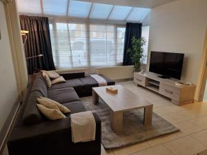 Tuinappartement van 175m² en 4 slaapkamers