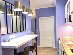 Appartements Suite Bubbles Spa - Luxe - Centre Ville - calme - wifi : photos des chambres