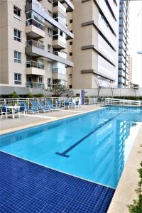 Apartamento 1604 no Bosque com um quarto sala cozinha completa e uma vaga de garagem