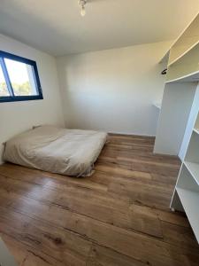 Appartements Joli appartement neuf avec jardinet : photos des chambres