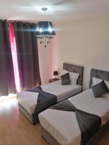 Magnifique appartement Les perles de marrakech lux avec 2 piscines