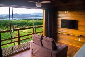 Lindos Bangalos a beira da Lagoa com hidromassagem lareira e churrasqueira individual e cozinha completa