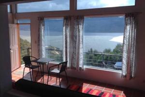 Cabaña vista al lago Tominė y Naturaleza Guatavita