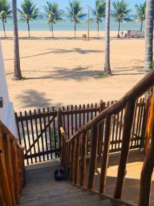 Suíte frente mar e pés na areia