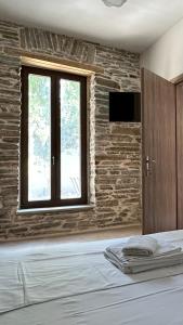 Stone house in Afissos