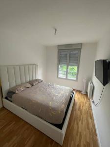 Appartements Nouveaute a 15 minutes de Paris : photos des chambres