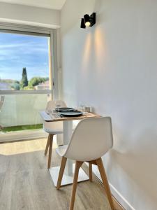 Appartements Studio Beaux Arts - *Proche centre *Clim *Balcon : photos des chambres