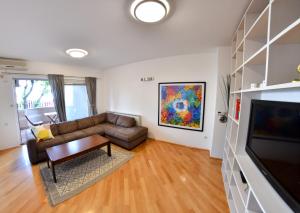 Spacious apartment with own garden and balcony