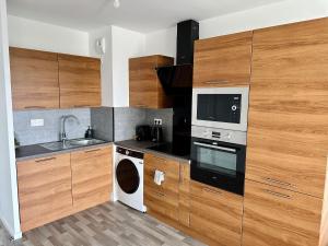 Appartements Agreable 2 pieces avec balcon et Parking transports by immo kit bnb : photos des chambres