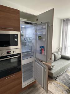 Appartements Agreable 2 pieces avec balcon et Parking transports by immo kit bnb : photos des chambres