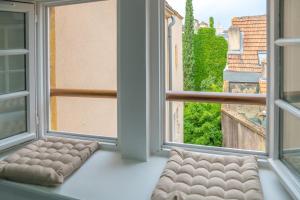 Appartements N° 8 - Metz City Centre - Travail & Loisirs : photos des chambres