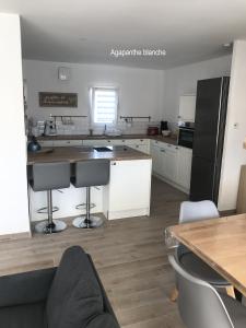 Maisons de vacances Les Agapanthes : photos des chambres