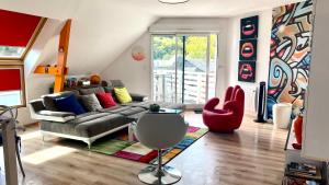 Appartements La Seine en couleurs : photos des chambres