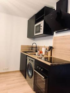 Appartements Charmant T1-Bis a Cuges-Les-Pins : photos des chambres