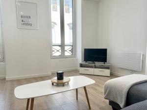 Appartements L'AUTHENTIQUE - Moderne - Central : photos des chambres