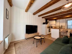 Appartements Les Poutres de Cuvier : photos des chambres