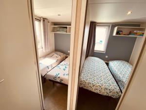 Campings Mobilhome P27 6 personnes climatise : photos des chambres