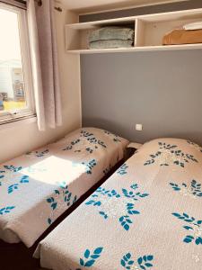 Campings Mobilhome P27 6 personnes climatise : photos des chambres