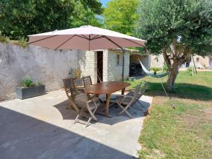 Maisons de vacances Maison pour 10 personnes avec piscine et proche de la plage : photos des chambres