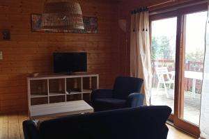 Chalets Chalet avec spa et piscine prives : photos des chambres