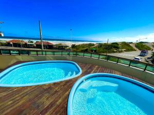 APARTAMENTO SOPHIA I - ORLA da PRAIA GRANDE - Praia dos Shows de RÉVEILLON