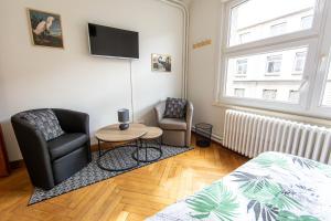 Appartements KASA 37 - Centre ville - Tout equipe - 2 TV : photos des chambres