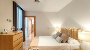 Housing Plaza de la Merced by SharingCo