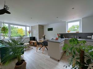 Appartements La foret Enchantee - Cozy Immo : photos des chambres
