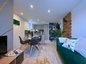 Appartements La foret Enchantee - Cozy Immo : photos des chambres