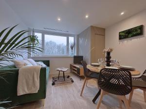 Appartements La foret Enchantee - Cozy Immo : photos des chambres