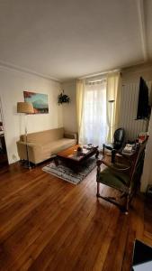 Appartements Cosy Parisian apartment by the Buttes Chaumont : photos des chambres