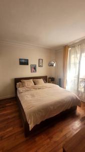 Appartements Cosy Parisian apartment by the Buttes Chaumont : photos des chambres