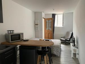 Appartements Studio en centre ville d'Argentan : photos des chambres