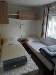 Appartements Mobil home 6-8 personnes Camping de dugny a ONZAIN : photos des chambres