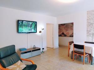 Appartements Le Pouy, Jardin, Terrasse & Stationnement : photos des chambres